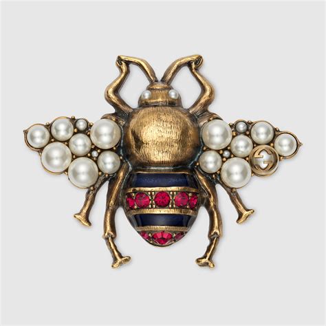 gucci bee brooch.